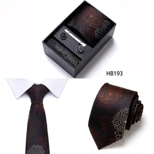Men business jacquard necktie set detail showing floral pattern, tie clip and pocket square.
