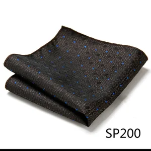 Men brown pocket square with blue polka dots, folded fabric handkerchief detail view accessory.