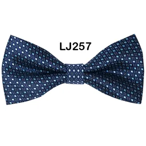 Detailed close-up of a mens navy blue star jacquard polyester bow tie for weddings.