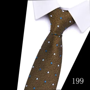 Men's brown polka dot jacquard tie with white shirt collar detail for business wear.