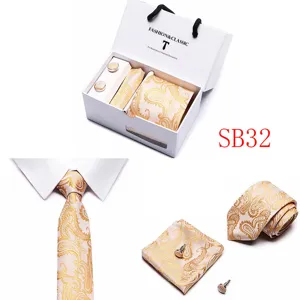 Elegant gold paisley silk tie pocket square and cufflinks gift set for formal business events.