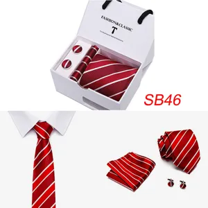Detail shot of red striped necktie gift set with pocket square and cufflinks for formal wear.