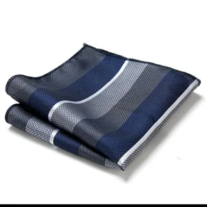 Men's striped pocket square handkerchief for business formal wear, elegant blue and grey folded.