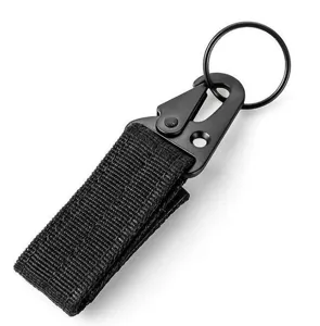 Close-up detail of black tactical keychain hook, durable nylon webbing with metal carabiner clip.