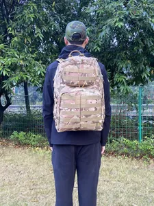 Camouflage tactical backpack for outdoor sports, hiking, and military training use.