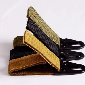 Tactical backpack webbing keychain hook with metal carabiner, multi-color outdoor gear clip.