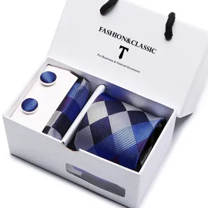 Blue geometric striped necktie set with cufflinks and pocket square in a luxury white gift box.