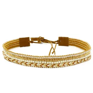 Elegant woven hat band and decorative belt with faux pearls, beads and leather ends.