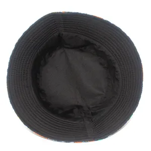 Detailed top-down view of the black inner lining and stitching of a stylish bucket hat.