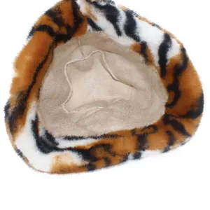 Furry tiger print bucket hat detail showing soft plush texture and cozy winter interior.