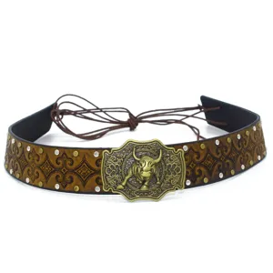 Detailed shot of vintage brown leather hat band with bull buckle and metal rivets design.