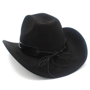 Close-up detail of black suede cowboy hat featuring stylish leather band and cord trim.