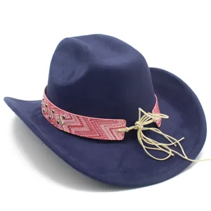 Detailed view of the wide brim fedora hat featuring a stylish pink patterned hat band.
