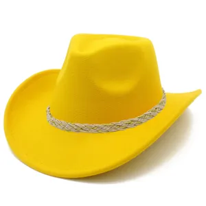 Yellow western cowboy hat detail, wide brim, braided band, outdoor sun protection fashion.