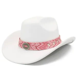 Detail view of white western cowboy hat featuring pink patterned band and vintage metal buckle.