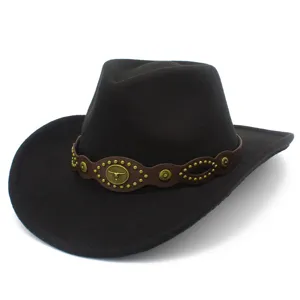 Detailed view of black cowboy jazz hat with brown leather band and metal bull head accessory.