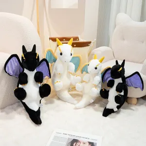 Detailed view of cute cartoon dragon plush toys cozy bedroom setting soft stuffed pillows.