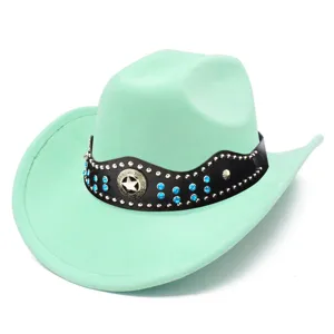 Close up of mint green suede cowboy hat with black studded band and sparkling blue rhinestones.