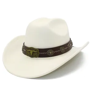 Detail shot of retro western cowboy hat with brown leather band and bronze bull skull buckle.