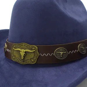 Close-up of vintage western cowboy hat brown leather band bull skull metal buckle detail