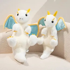 Cute white plush dragon toy with blue wings and yellow horns, soft cartoon doll pillow for kids and gift.