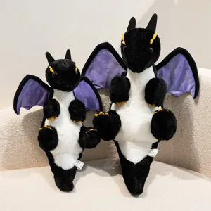 Cute black dragon plush toy detail showing soft fabric, purple wings and lovely expression.