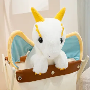 Cute white plush dragon toy with blue wings and yellow horns, perfect soft toy for kids and gifts.