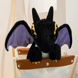 Cute black dragon plush toy with purple wings and yellow horns for kids and home decor.