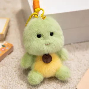 Cute green plush animal keychain pendant fluffy plush plushie toy bag decoration detail view.