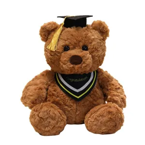 Cute brown graduation teddy bear plush toy with cap and scarf, perfect gift for graduates.