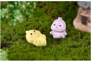 Mini resin dinosaur figurine detail shot, cute micro landscape gardening DIY ornament display.