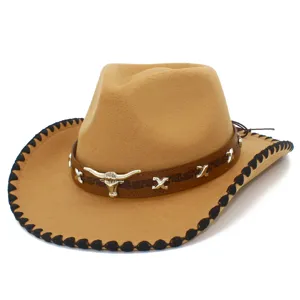 Detailed view of a khaki felt western cowboy hat with metal bull skull emblem and black brim.