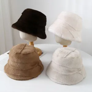 Plush bucket hat detail showing soft faux fur material and pleated design in multiple colors.