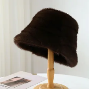 Dark brown plush bucket hat detail, warm winter furry fuzzy basin hat, cozy pleated fashion.