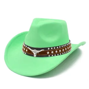 Bright green suede cowboy hat detail, featuring studded brown band with silver bull skull.