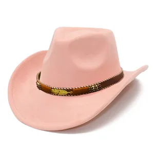 Close-up detail of the pink suede western cowboy hat featuring a woven band and gold feather.