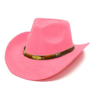 Close-up of pink suede western cowboy hat featuring brown decorative band and metal leaf charm.