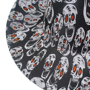 Halloween skull top hat detail, black jazz hat with white spooky skull print for party wear.