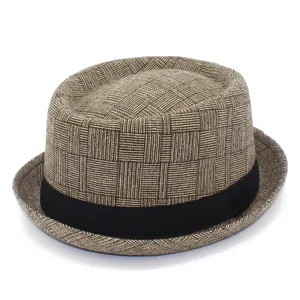 Plaid jazz hat detail showcasing the classic brown woven pattern and black ribbon band.