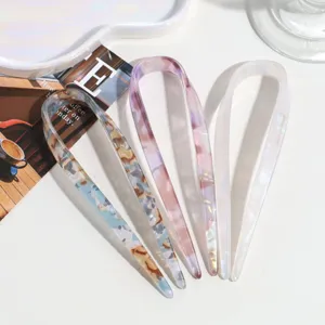 U-shaped hairpin details showing exquisite texture, minimalist chic hair fork for women bun styling.
