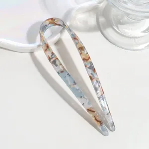 Elegant minimalist U-shaped hair fork, tortoiseshell marbled design for daily chic styling.
