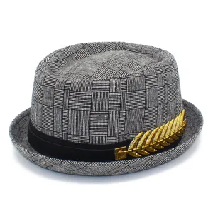 Men's stylish plaid fedora hat with a golden leaf decoration and black band detail.
