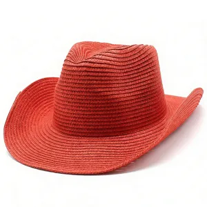 Détail de chapeau de cow-boy en paille tressée rouge, chapeau de soleil respirant.