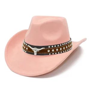 Pink suede western cowboy hat detail showing studded leather band and silver bull skull accent.