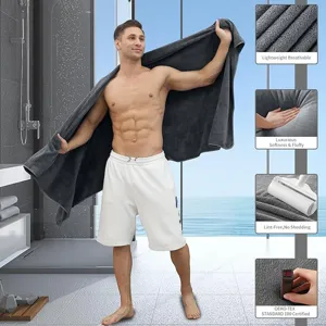 Thickened coral fleece bath towel, super absorbent, soft and fluffy, ideal for daily or gym use.