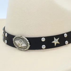 Punk style western cowboy fedora hat detail featuring black leather band, metal stars and studs.