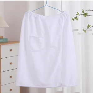 White wearable bath towel wrap with snap buttons and pocket for home shower and spa use.