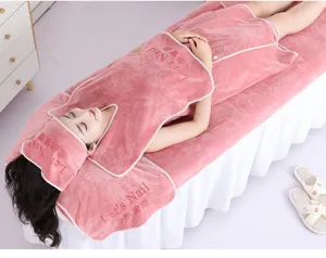 Roze koraalvleece schoonheidssalon handdoekset, zachte SPA bedlaken hoes en haarband voor gebruik.