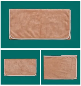 Detailed view of soft beauty salon towel fabric, fine hemming and velcro closure structure.