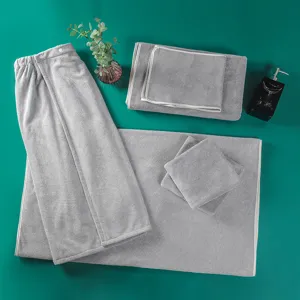 Grey salon towel set five-piece bath wrap and bed sheets for spa and beauty care.